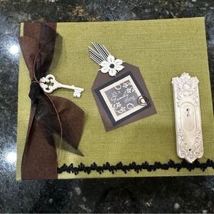 Green Decorative Handmade Scrapbook with Key and Ribbon Details Family Themed